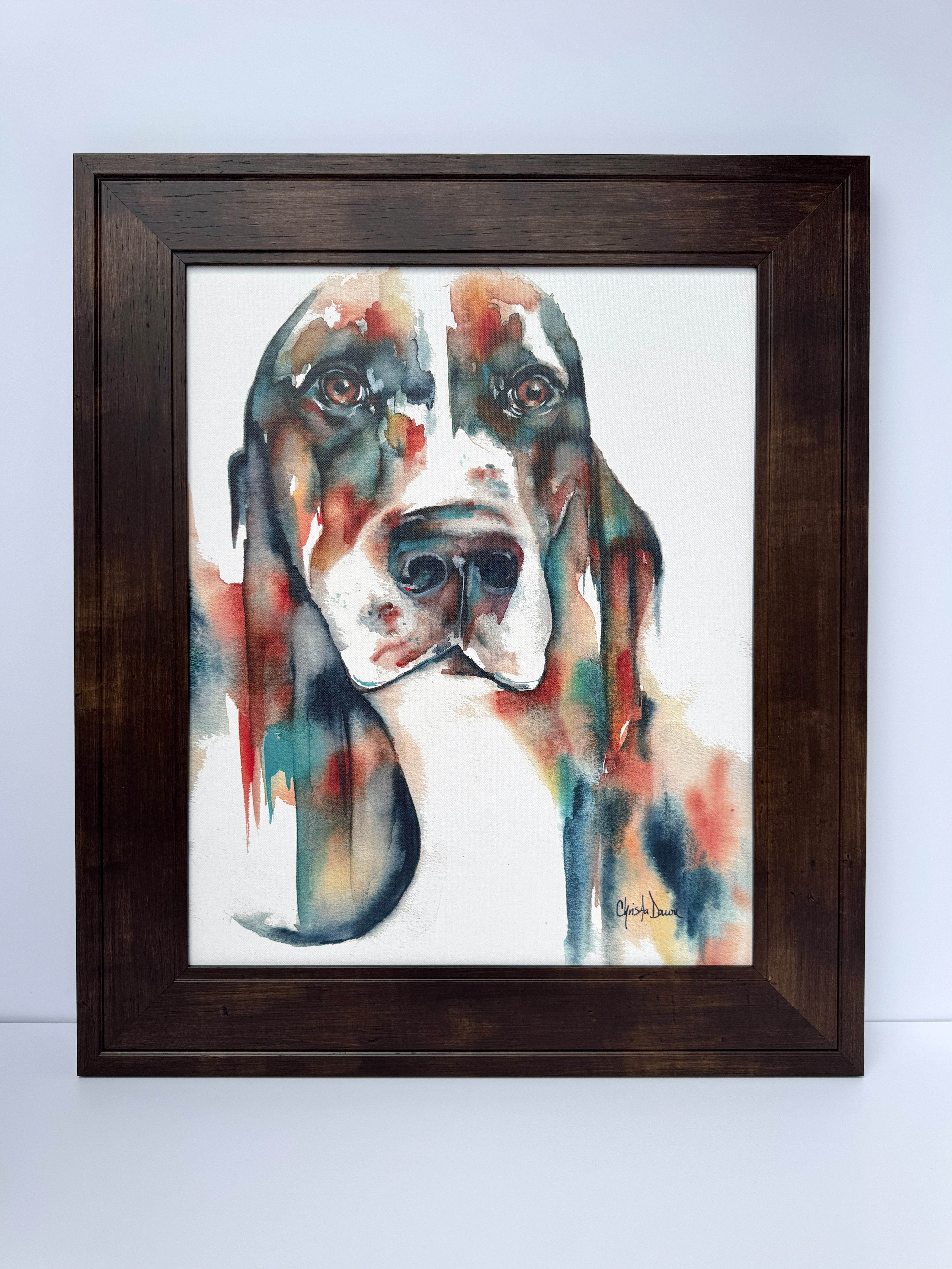 Bold colored watercolor basset on canvas with soulful eyes